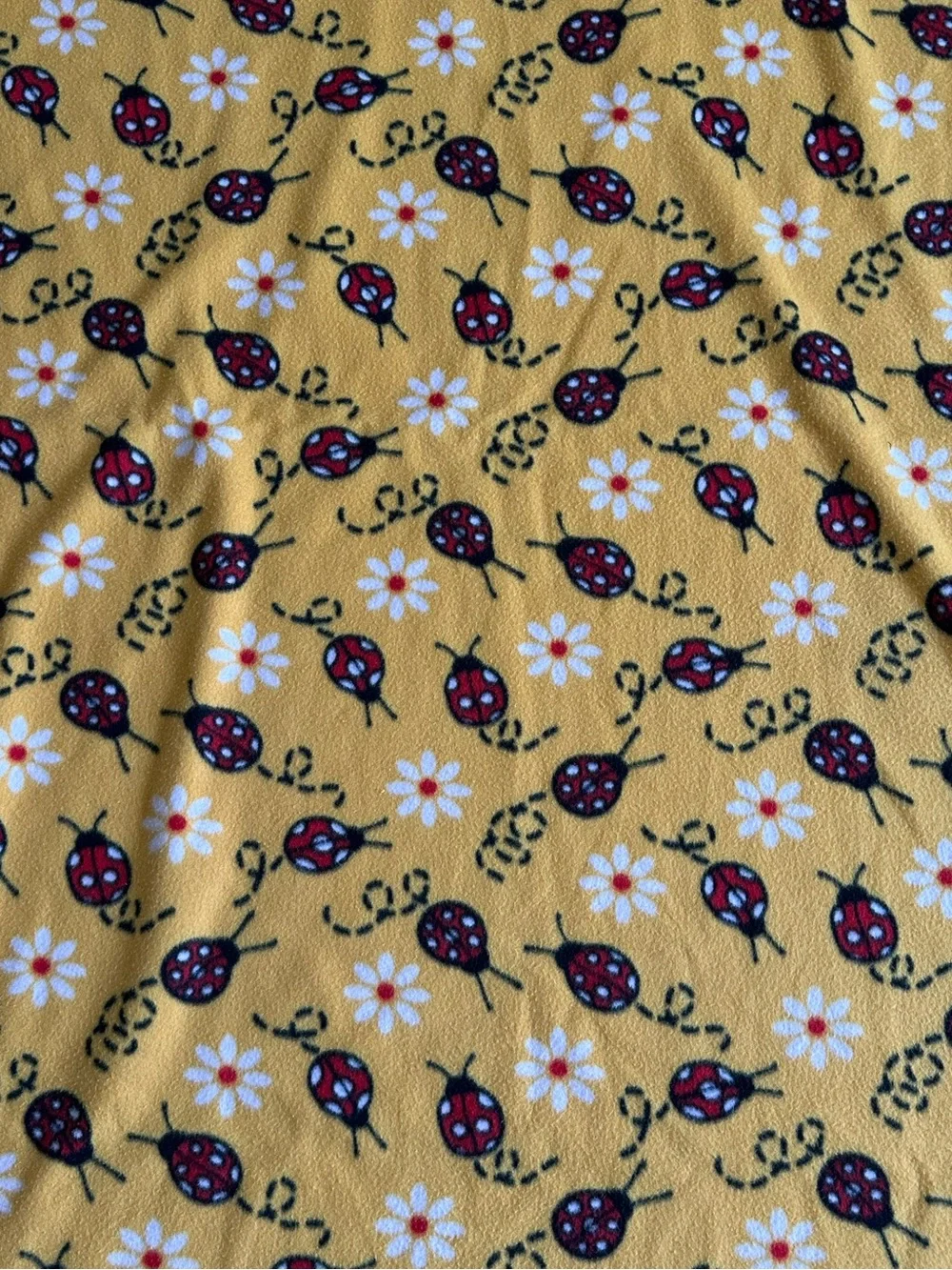 Soft Yellow Blanket with ladybugs and daisies